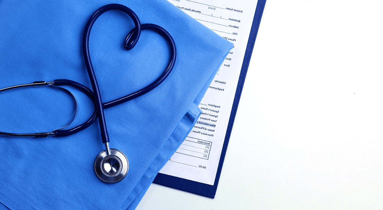 Stethoscope lies on a medical gown